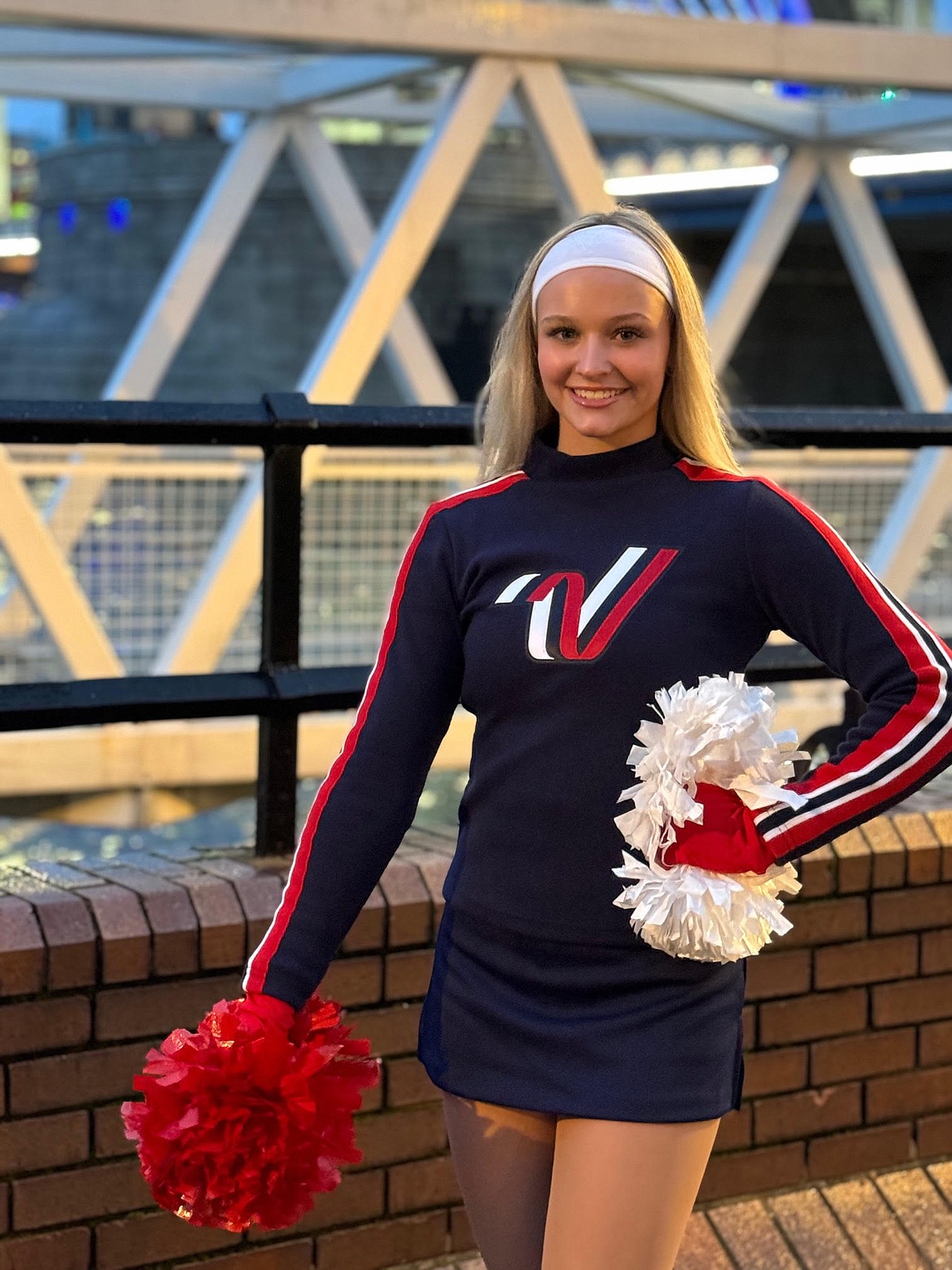 Sixth-generation Coeur d'Alene resident Sophia Green, 16, poses in front of a famous bridge in London, where she and the Varsity Spirit All-American Cheer team performed in the New Year's Day Parade.