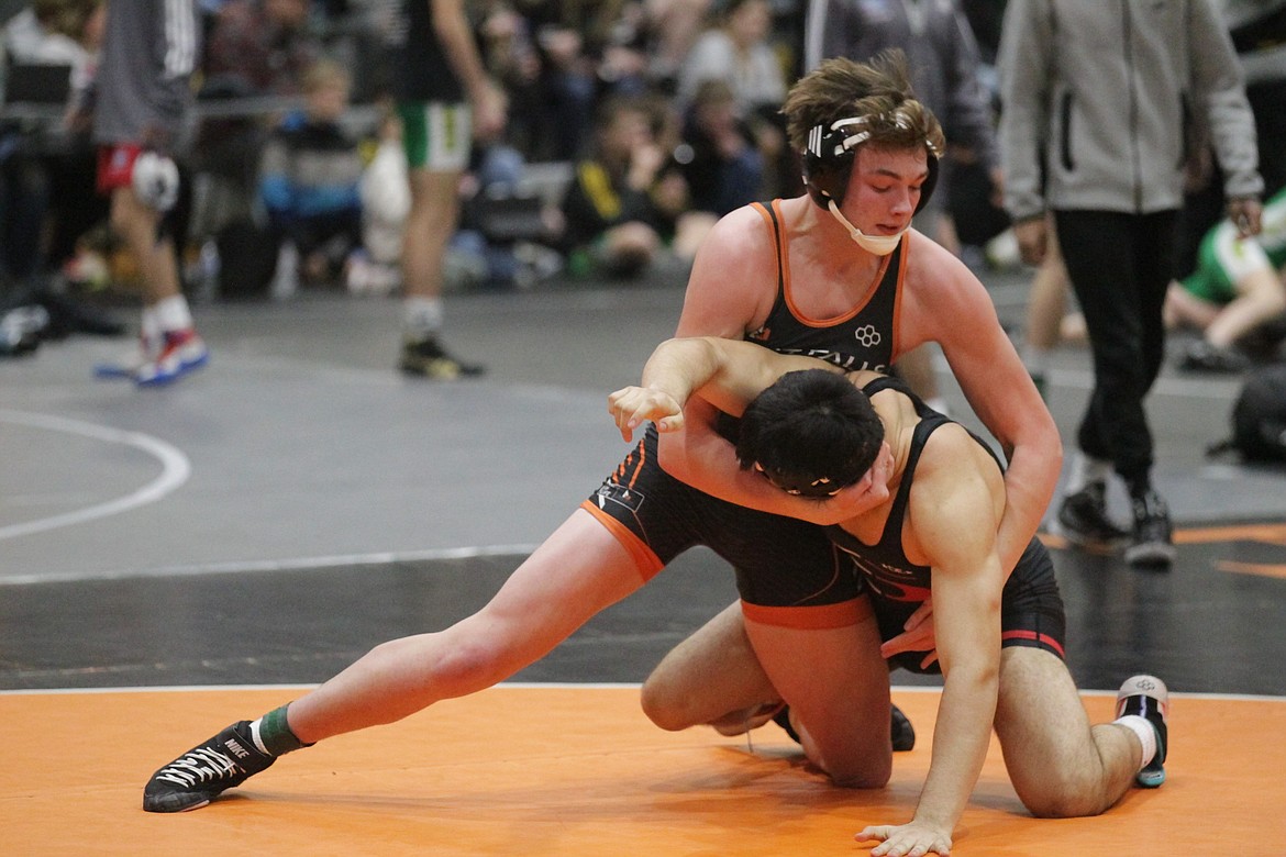 MARK NELKE/Press
Post Falls junior Kendall Sage looks to control Andres Graciano-Pulido of Sunnyside (Wash.) at 195 pounds in the semifinal round of the River City Duals on Saturday at Post Falls High. Sage won by pin.