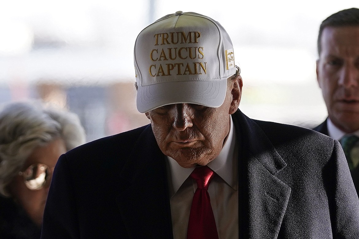 Republican presidential candidate former President Donald Trump arrives to pick up pizza at a Casey's in Waukee, Iowa, Sunday, Jan. 14, 2024. (AP Photo/Andrew Harnik)