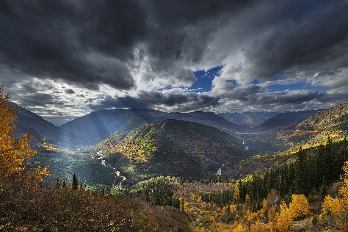 Autumn rays shine on the McDonald Valley of Glacier National Park in this photo by Whitefish photographer Chuck Haney.