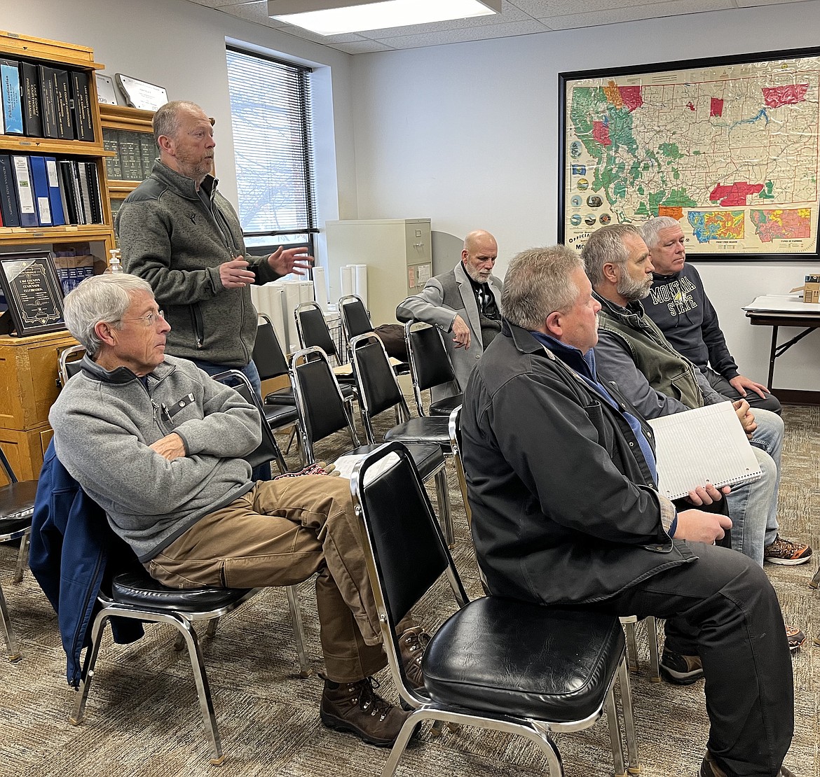 Clarence Walhood of W&W Marine expresses frustration with the pace of permitting lakeshore projects. "It's a hard burn," he said during last week's commission meeting. (Kristi Niemeyer/Leader)