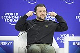 At Davos, Zelenskyy lashes out at Putin and presses allies to boost Ukraine's fight
