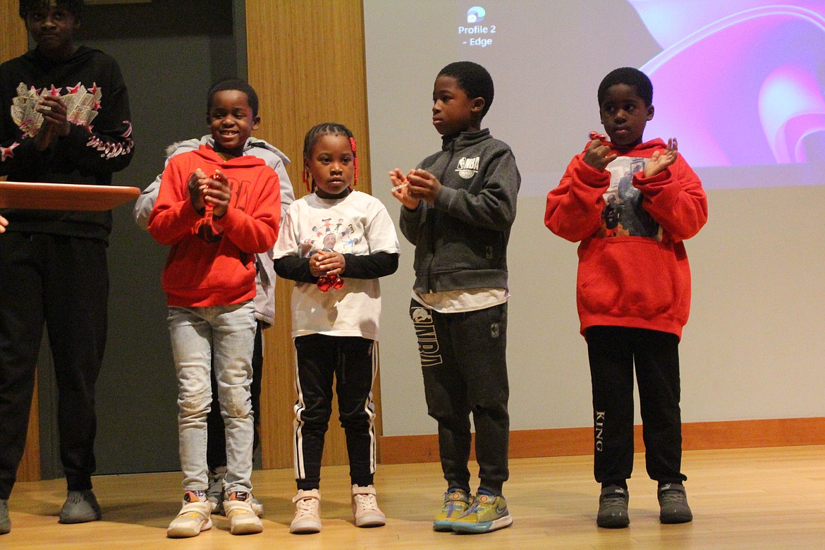 Members of the Dreamers in Action youth group let freedom ring during Monday’s commemoration of Martin Luther King Day.