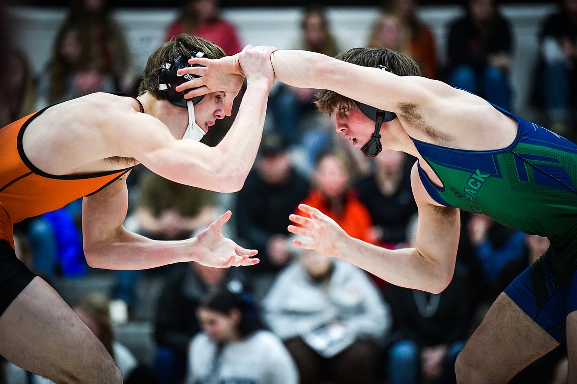 GLACIER’S KALEB SHINE, right, wrestles Flathead’s Cade Troupe at last year’s Crosstown Duals. Shine has a marquee matchup at 145 pounds with Flathead’s Dane Lake Thursday, at Glacier High. (Casey Kreider/Daily Inter Lake)