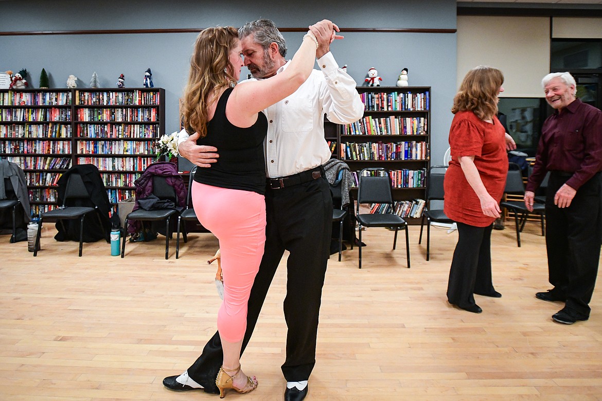 Candace Zumalt and Tony Popp dance the Argentine tango at a Kalipsell Tango class at the Kalispell Senior Center on Tuesday, Jan. 16. (Casey Kreider/Daily Inter Lake)