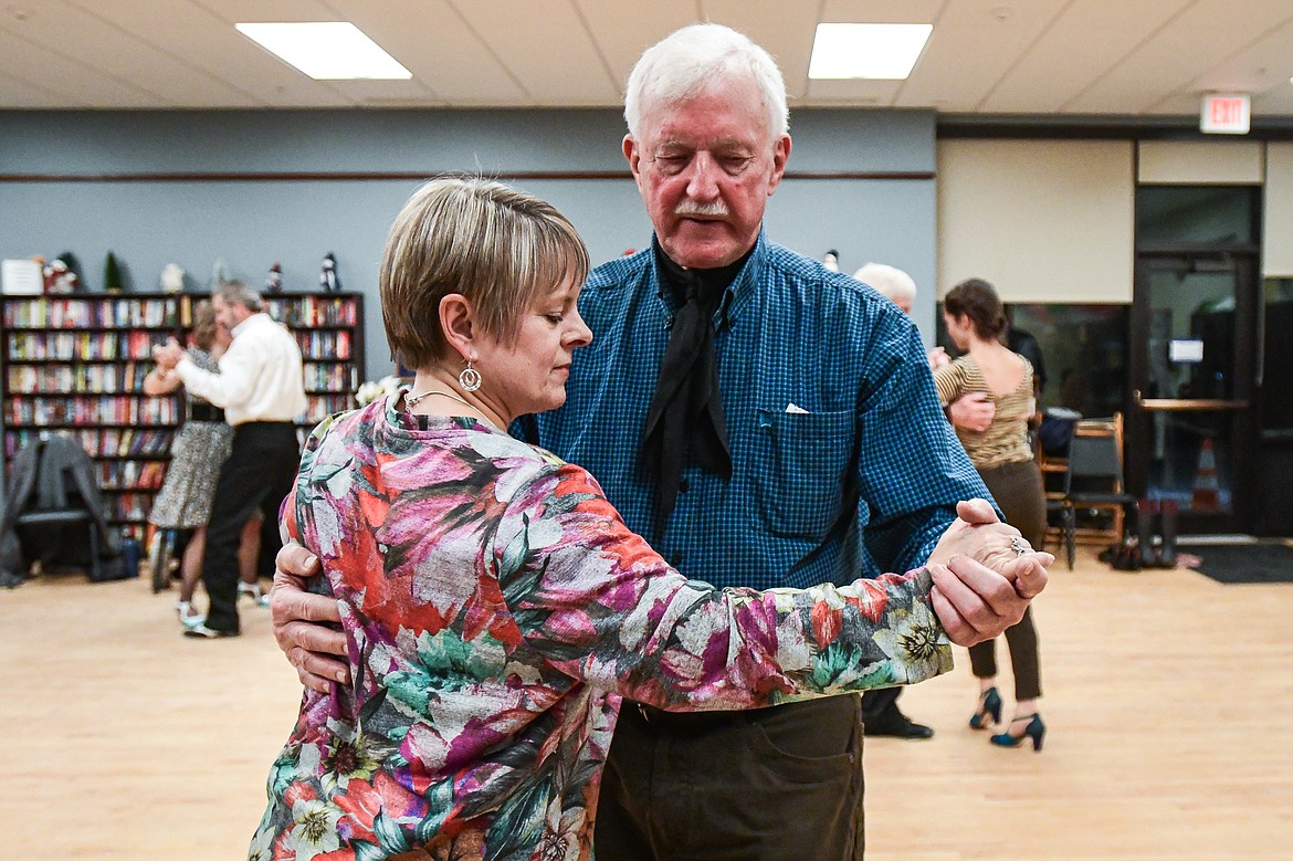 Lee Anne Byrne and Mike Scott practice the Argentine tango at a Kalipsell Tango class at the Kalispell Senior Center on Tuesday, Jan. 16. (Casey Kreider/Daily Inter Lake)