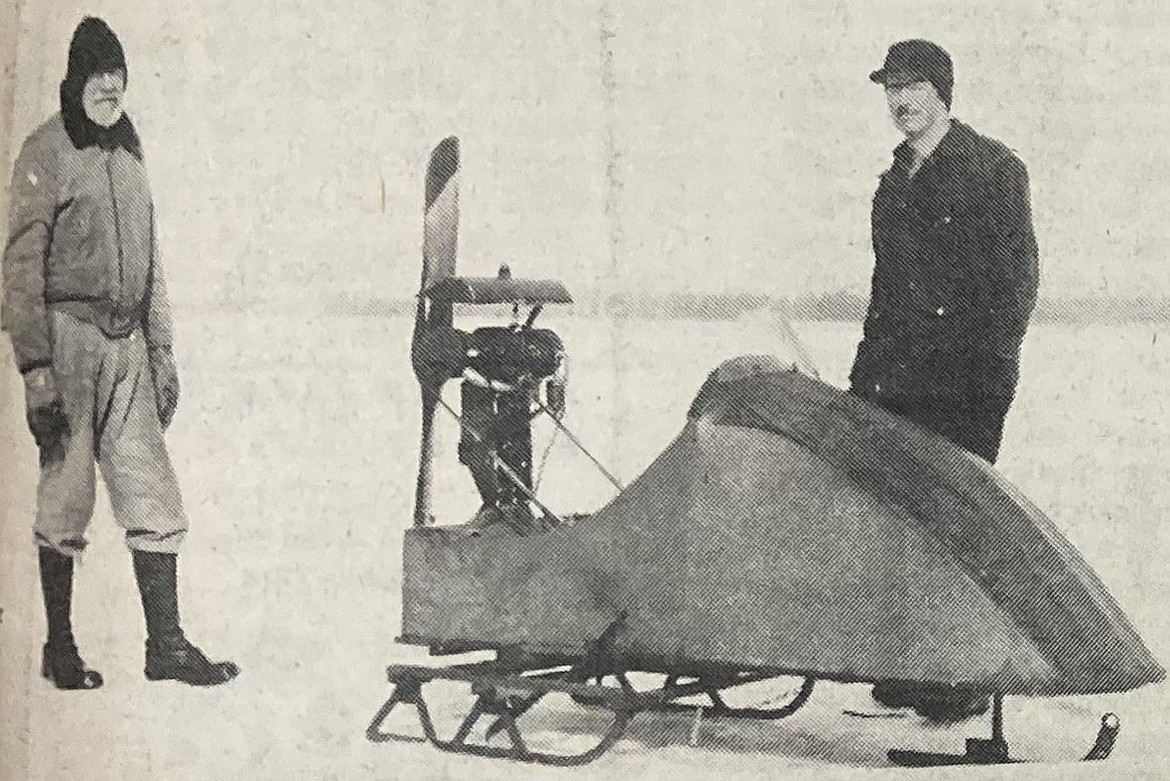 Fred Murphy, right, and a Casco Bay neighbor are shown with Fred's “motor sled."