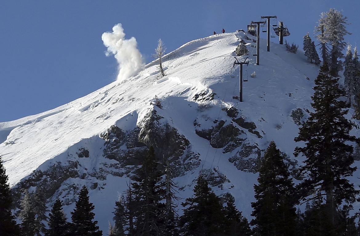 A charge is detonated to remove avalanche risk near the scene of Wednesday's deadly slide at Palisades Tahoe Ski resort in Olympic Valley, Calif., on Thursday, Jan. 11, 2024. As a massive winter storm dumped snow across much of the western U.S., winter sport enthusiasts headed to ski resorts and backcountry slopes ahead of the long Martin Luther King Jr. Day weekend. But in many areas, the storm brought a high risk of avalanche conditions.(Scott Strazzante/San Francisco Chronicle via AP, File)