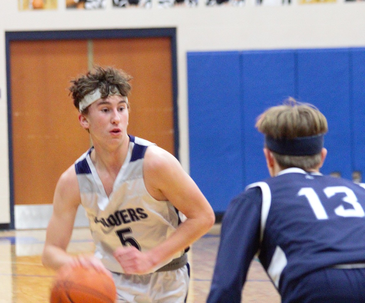 Brody Rice runs the ball against the Coeur De Christ Saints.