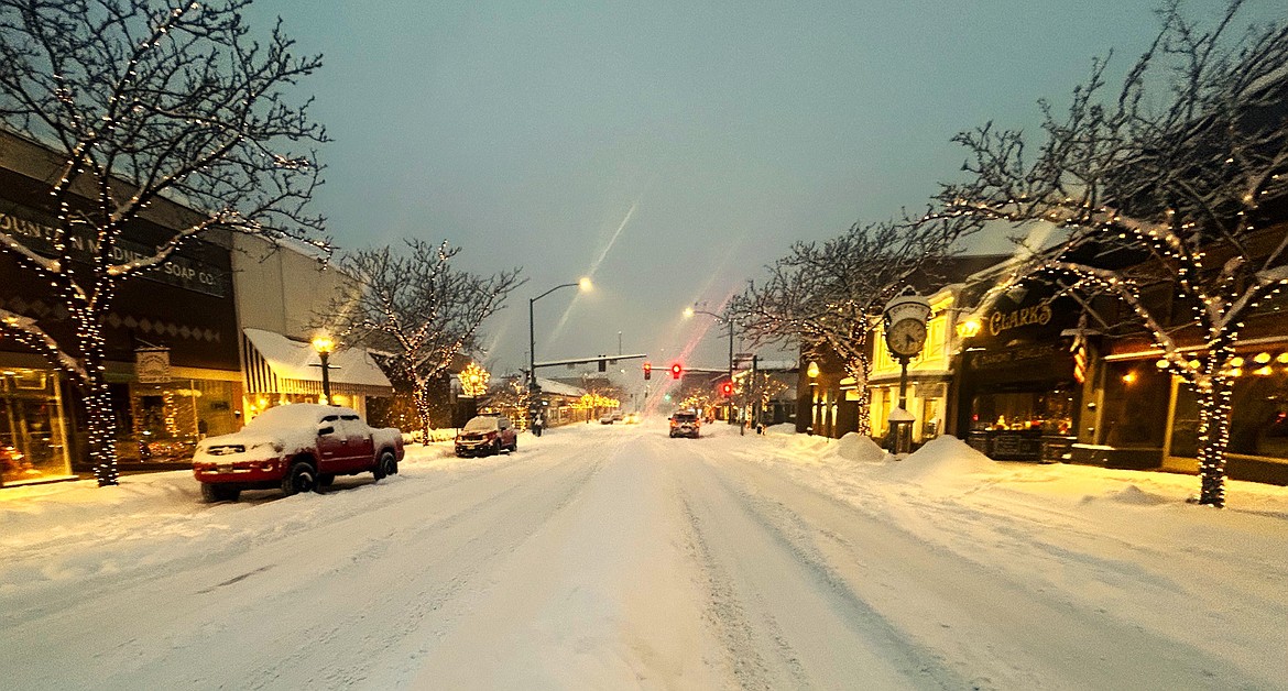 Snow and lights give a glow to Sherman Avenue on Wednesday.