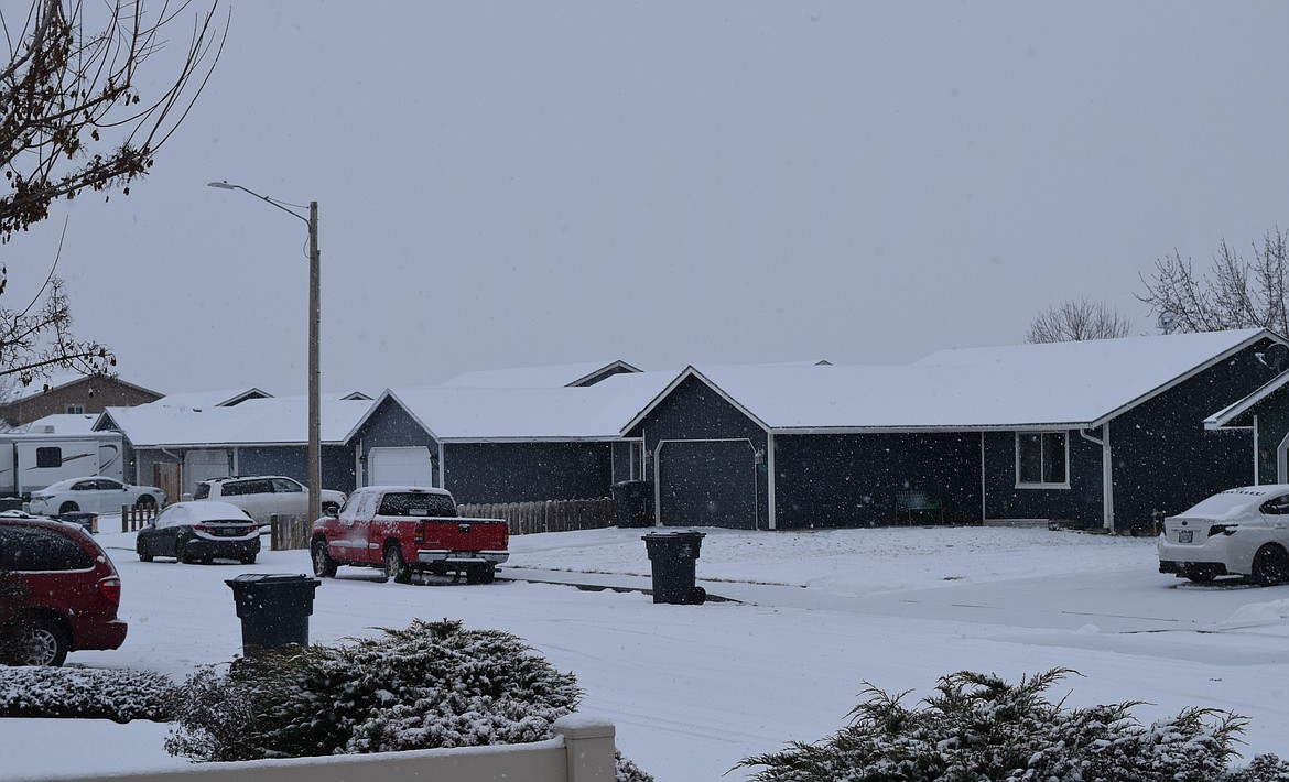 Cobblestone Avenue in Othello as it snows following severe cold weather in the region. Both the city of Othello and the city of Ritzville both refer potential community members in need to local resources within their respective communities.