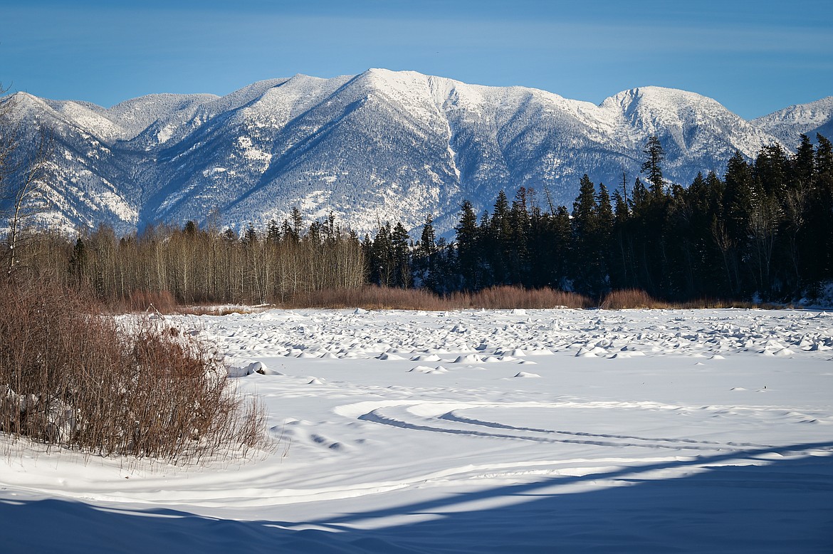 Snow and ice across the entire Flathead River at the Old Steel Bridge Fishing Access on Thursday, Jan. 19. (Casey Kreider/Daily Inter Lake)