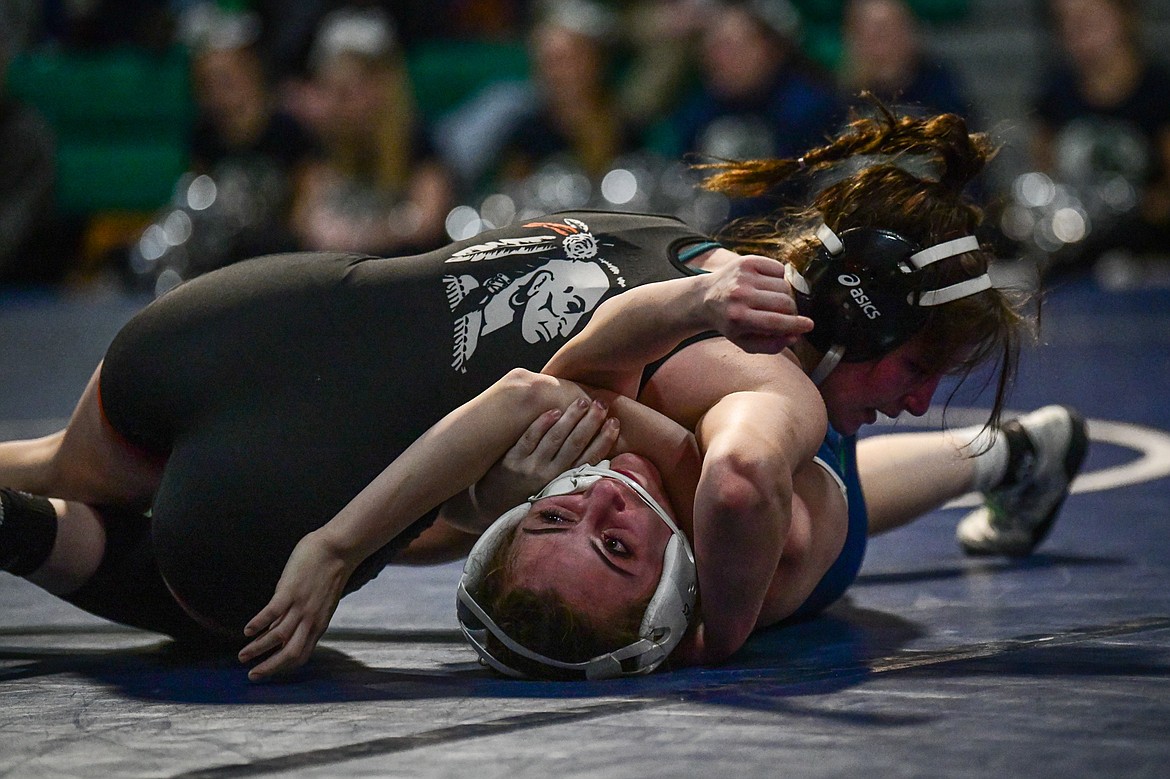 Flathead's Brady Boll wrestles Glacier's Mikaela Julius at 126 lbs. at Glacier High School on Thursday, Jan. 18. (Casey Kreider/Daily Inter Lake)