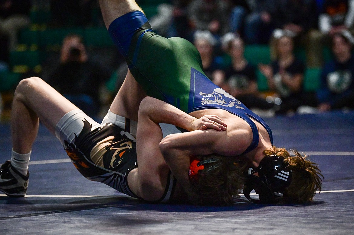 Glacier's Kaleb Shine wrestles Flathead's Dane Lake at 145 lbs. at Glacier High School on Thursday, Jan. 18. (Casey Kreider/Daily Inter Lake)