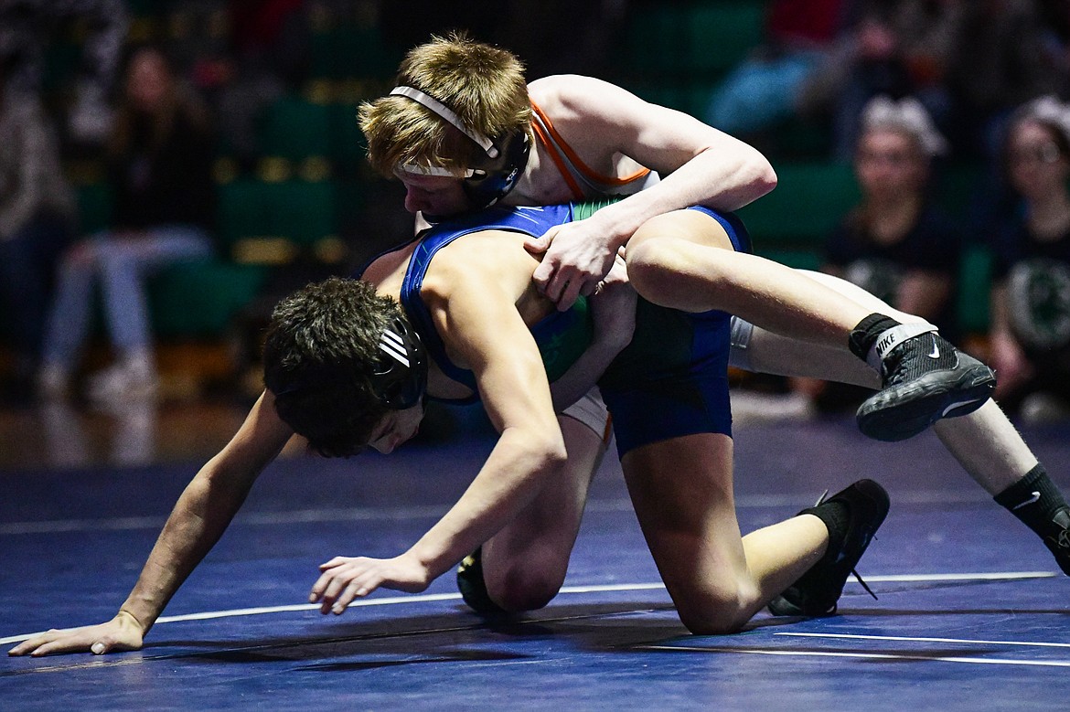 Flathead's Kellen Downing wrestles Glacier's Aiden Sweat at 103 lbs. at Glacier High School on Thursday, Jan. 18. (Casey Kreider/Daily Inter Lake)