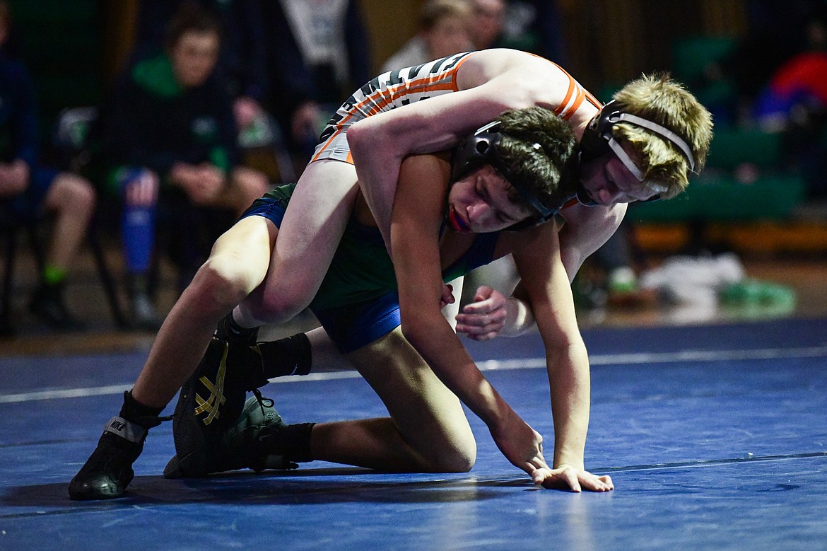 Flathead's Kellen Downing wrestles Glacier's Aiden Sweat at 103 lbs. at Glacier High School on Thursday, Jan. 18. (Casey Kreider/Daily Inter Lake)