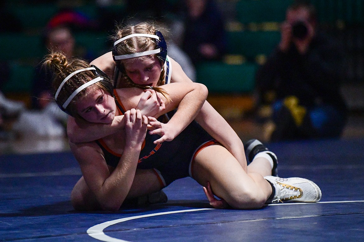 Glacier's Kylie Shine wrestles Flathead's Kiera Lackey at 132 lbs. at Glacier High School on Thursday, Jan. 18. (Casey Kreider/Daily Inter Lake)