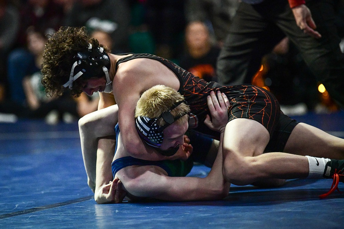 Flathead's Hunter Arriaga wrestles Glacier's Garrett Bosch at 120 lbs. at Glacier High School on Thursday, Jan. 18. (Casey Kreider/Daily Inter Lake)