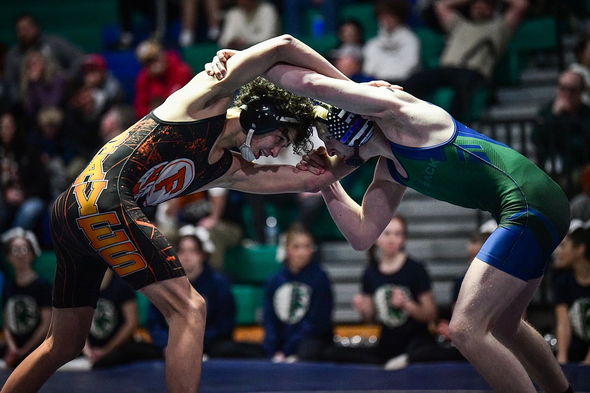 Flathead's Hunter Arriaga wrestles Glacier's Garrett Bosch at 120 lbs. at Glacier High School on Thursday, Jan. 18. (Casey Kreider/Daily Inter Lake)