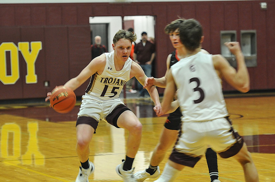 Troy's Nolan Morris looks for an opening in a game on Tuesday, Jan. 16, against Eureka. (Hannah Chumley/The Western News)