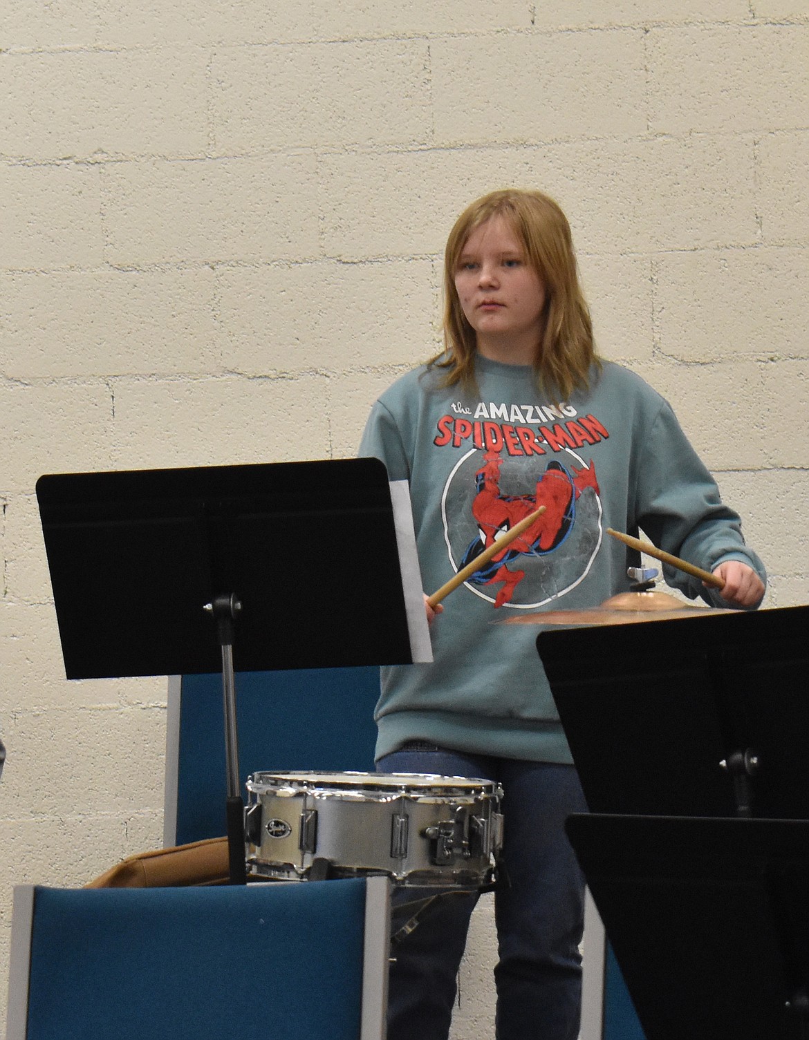 Kaylee Schmidt practices drums in Moses Lake Christian Academy’s eighth-grade band Thursday.