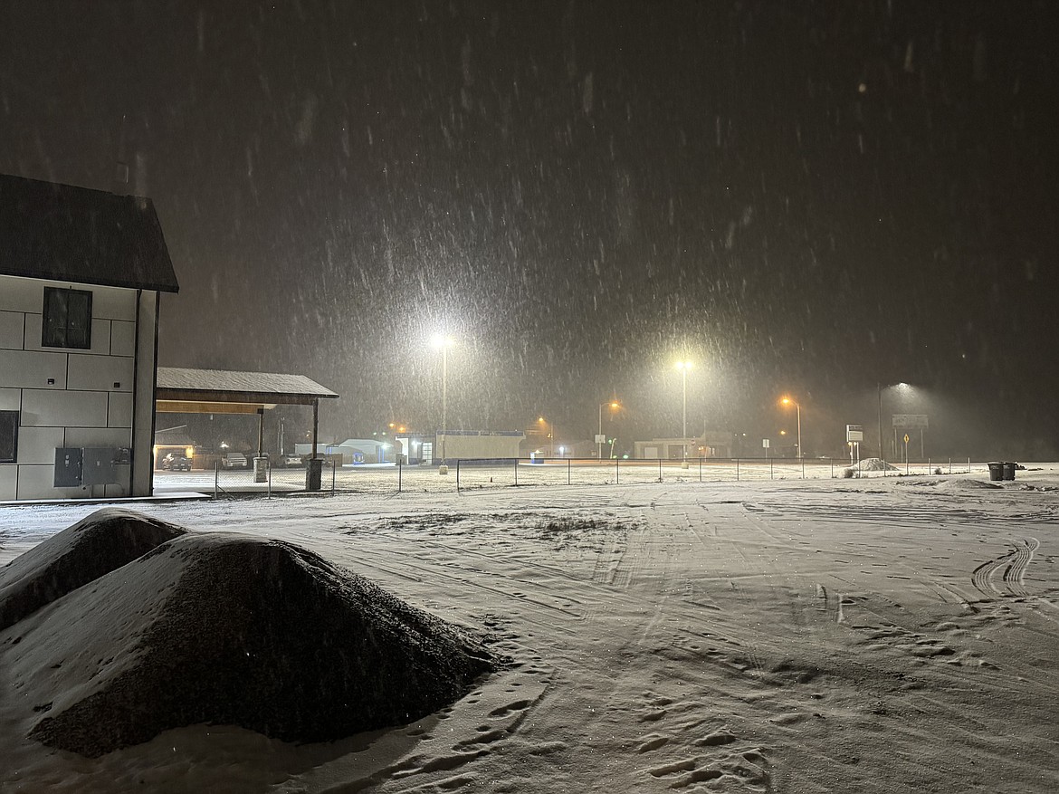 Snow falls in Soap Lake Wednesday night. The snow is forecast to turn into rain eventually but not before some of the precipitation falls as freezing rain.