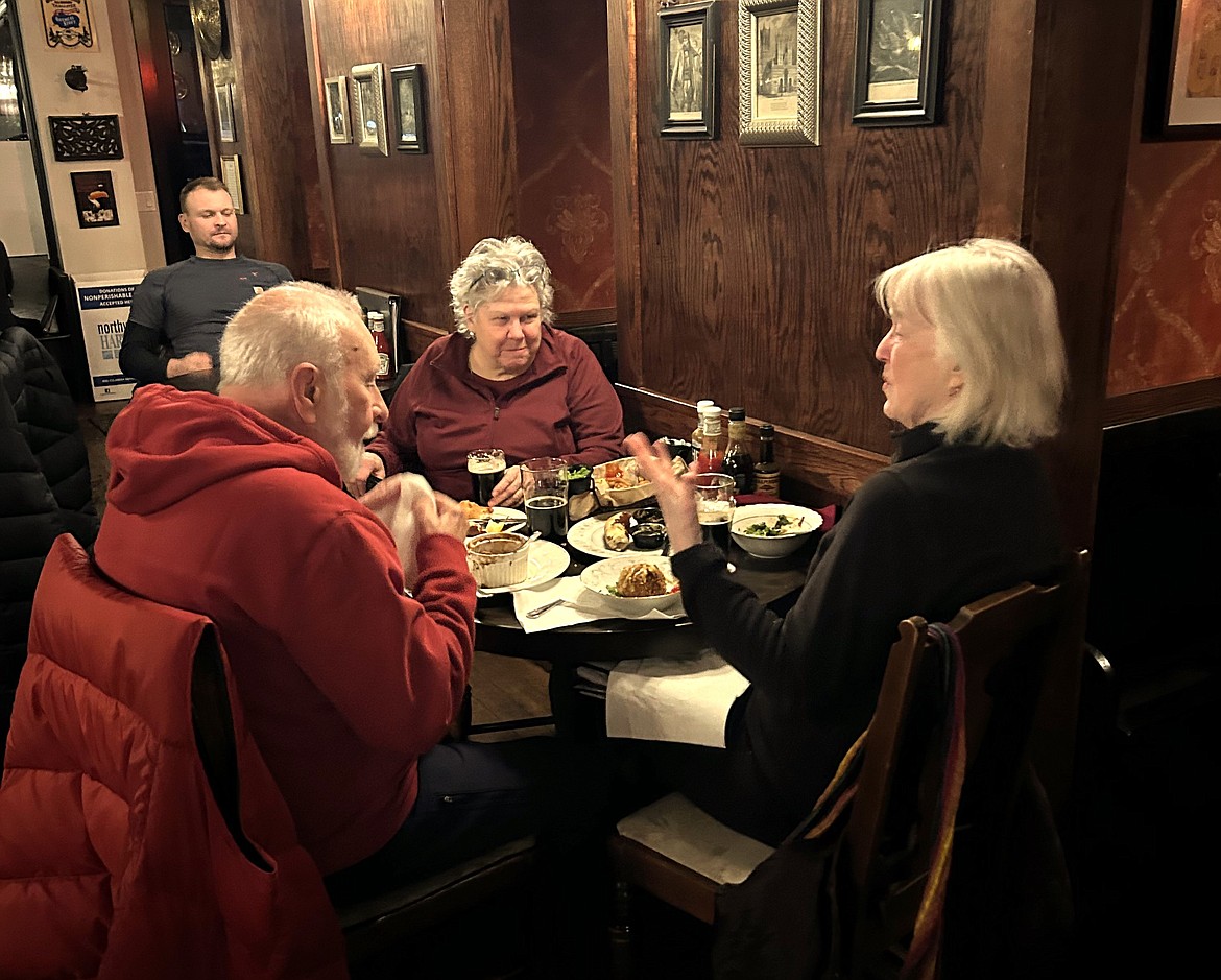 George and Julie Ives join Bridget Hill, center, for Beer Choir at Crown and Thistle Pub on Thursday.