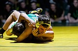 PREP WRESTLING: Coeur d'Alene sends nine to semis at Clearwater Classic