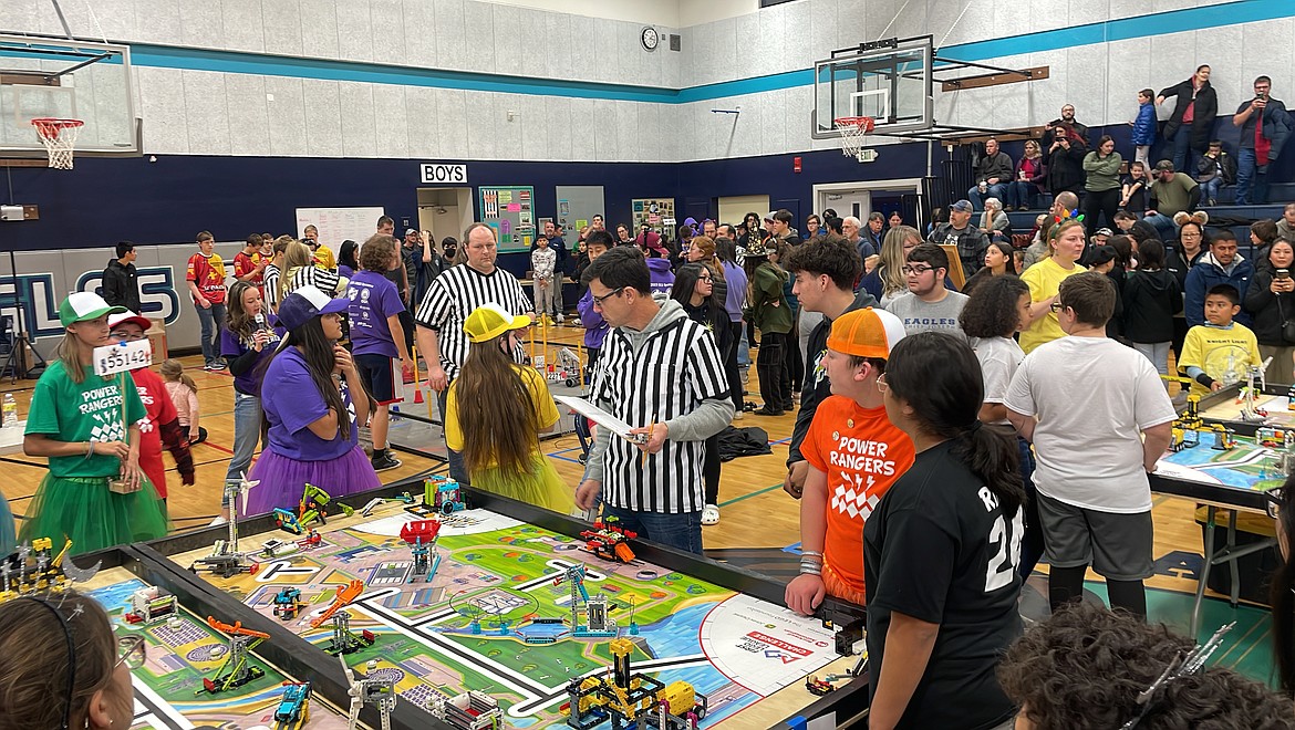 Members of the Royal School District Power Rangers robotics team during a March 2023 match. The robotics teams are one of the extracurricular activities funded by the district’s levy.