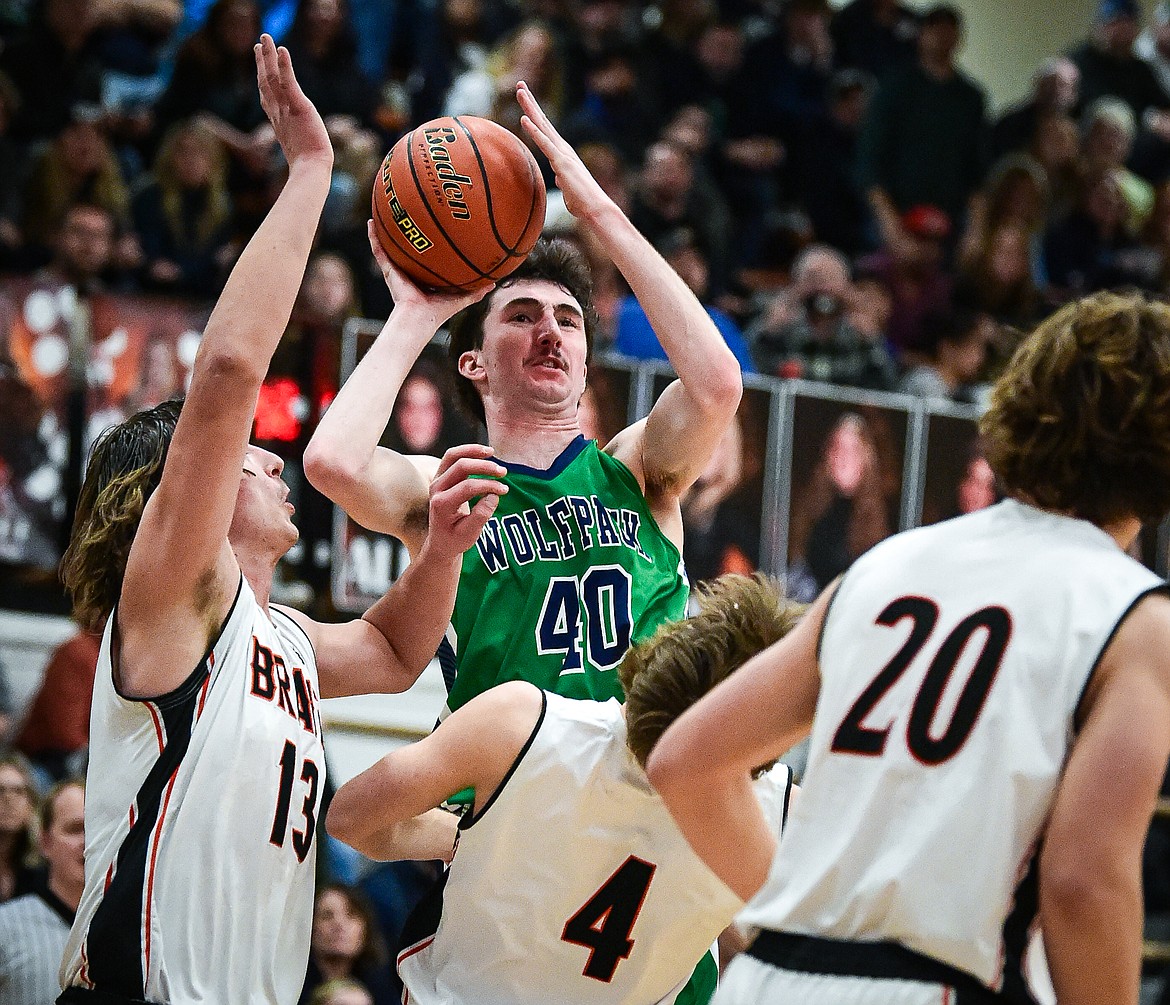 Glacier's Noah Cummings (40) works for an open shot in the first half against Flathead at Flathead High School on Friday, Jan. 19. (Casey Kreider/Daily Inter Lake)