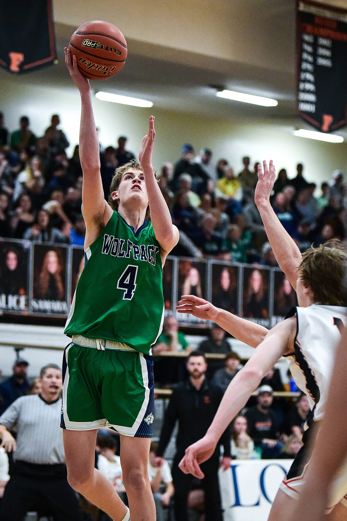 Glacier's Owen Henry (4) drives to the basket in the first half against Flathead at Flathead High School on Friday, Jan. 19. (Casey Kreider/Daily Inter Lake)