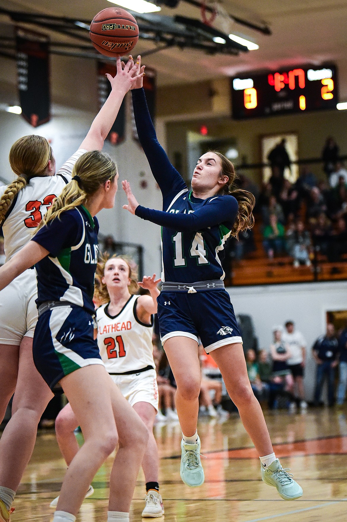 Glacier's Karley Allen (14) drives to the basket against Flathead at Flathead High School on Friday, Jan. 19. (Casey Kreider/Daily Inter Lake)