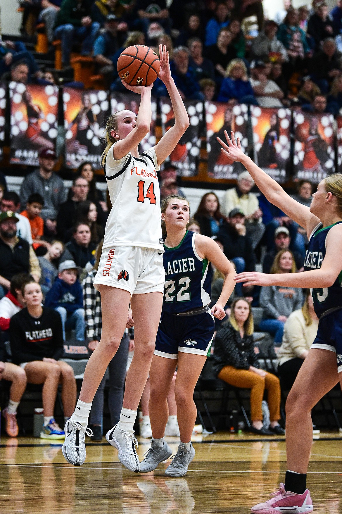 Flathead's Kennedy Moore (14) shoots in the second half against Glacier at Flathead High School on Friday, Jan. 19. (Casey Kreider/Daily Inter Lake)