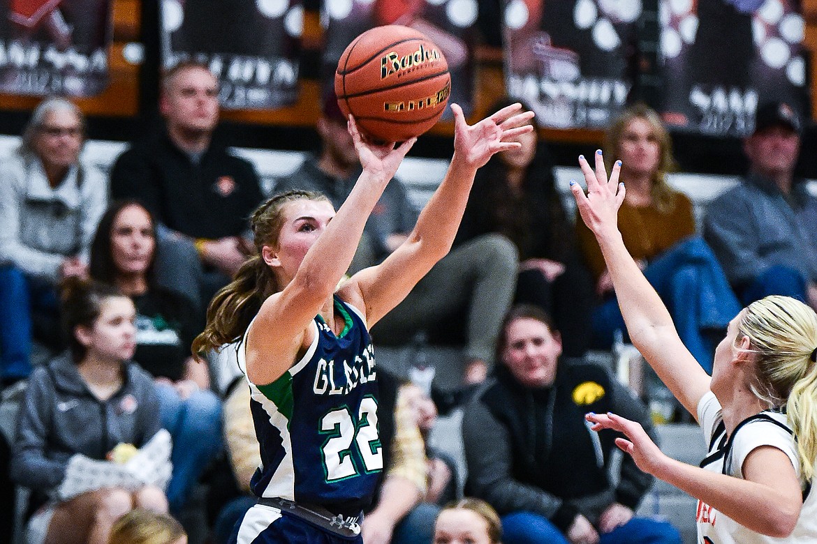 Glacier's Noah Fincher (22) shoots from the corner against Flathead at Flathead High School on Friday, Jan. 19. (Casey Kreider/Daily Inter Lake)