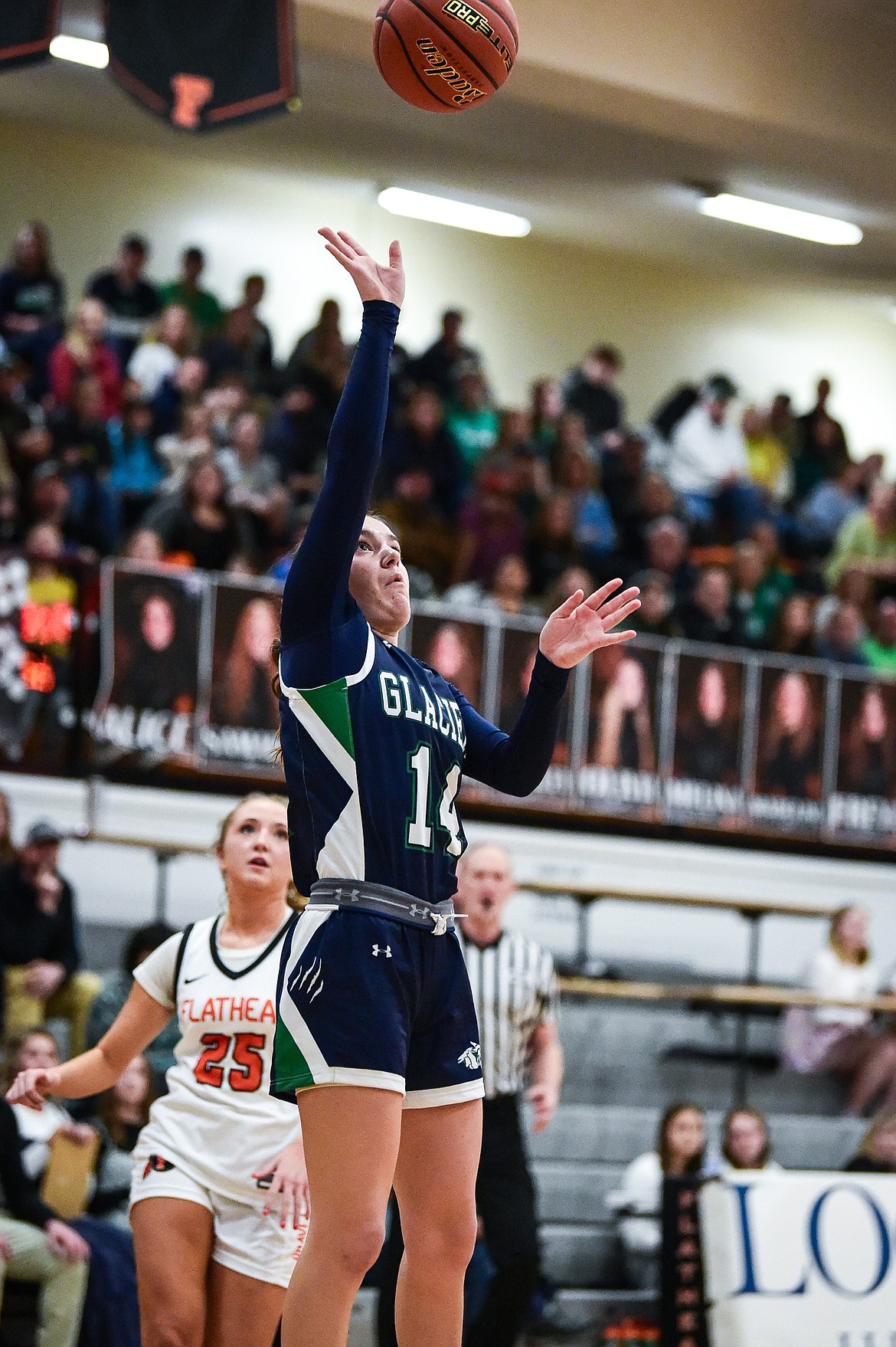 Glacier's Karley Allen (14) drives to the basket against Flathead at Flathead High School on Friday, Jan. 19. (Casey Kreider/Daily Inter Lake)