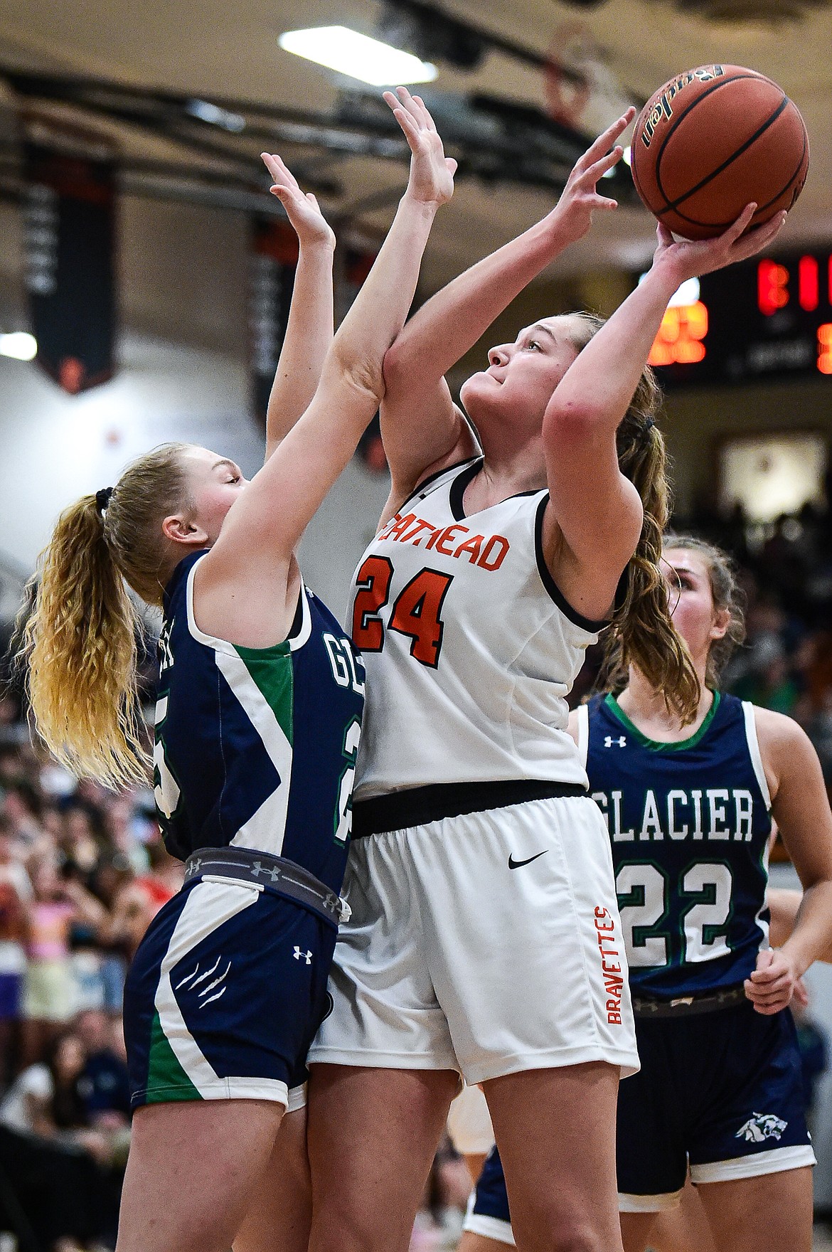 Flathead's Mattie Thompson (24) shoots guarded by Glacier's Cazzland Rankosky (25) at Flathead High School on Friday, Jan. 19. (Casey Kreider/Daily Inter Lake)