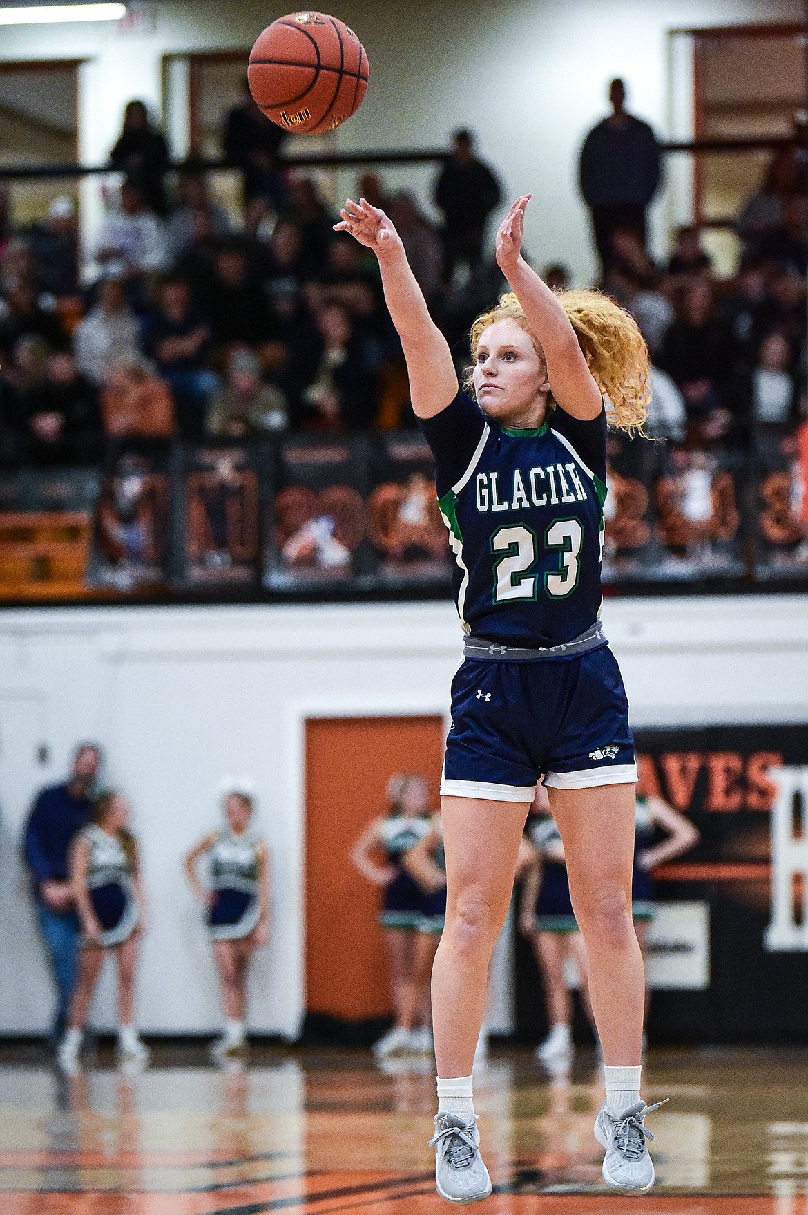 Glacier's Reese Ramey (23) knocks down a three in the first half against Flathead at Flathead High School on Friday, Jan. 19. (Casey Kreider/Daily Inter Lake)