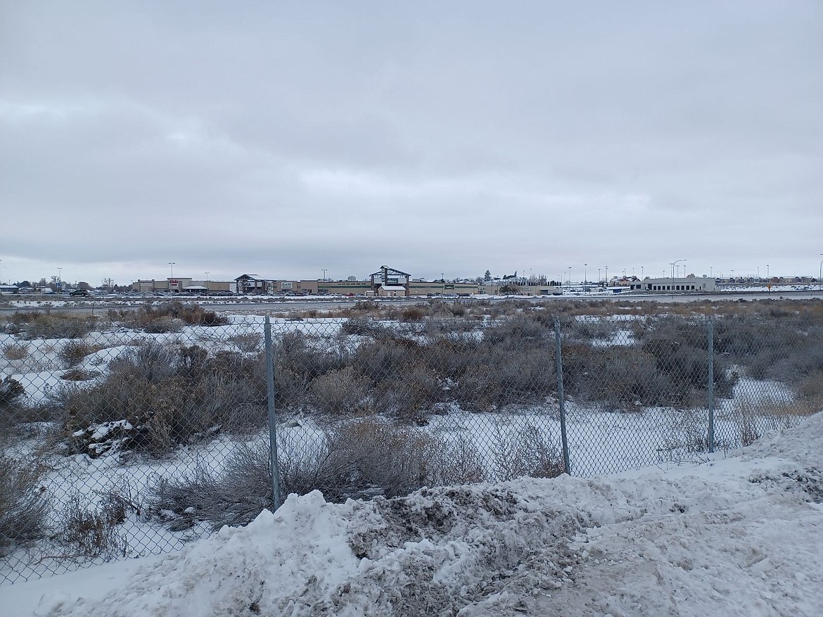 A bit of gloomy sky hangs over Moses Lake near the intersection of State Route 17 and Stratford Road. The weather over the next week is likely to be pretty cloudy but not quite as cold as the last couple of weeks.