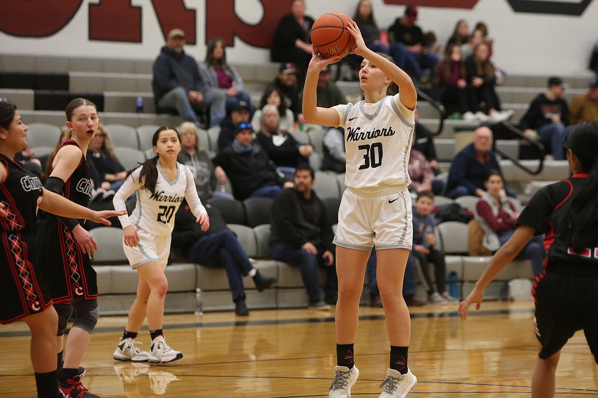 ACH freshman Josie Bayless (30) attempts a jump shot in the first half against Mary Walker Friday. Bayless tied for a team-high with 12 points in the win.