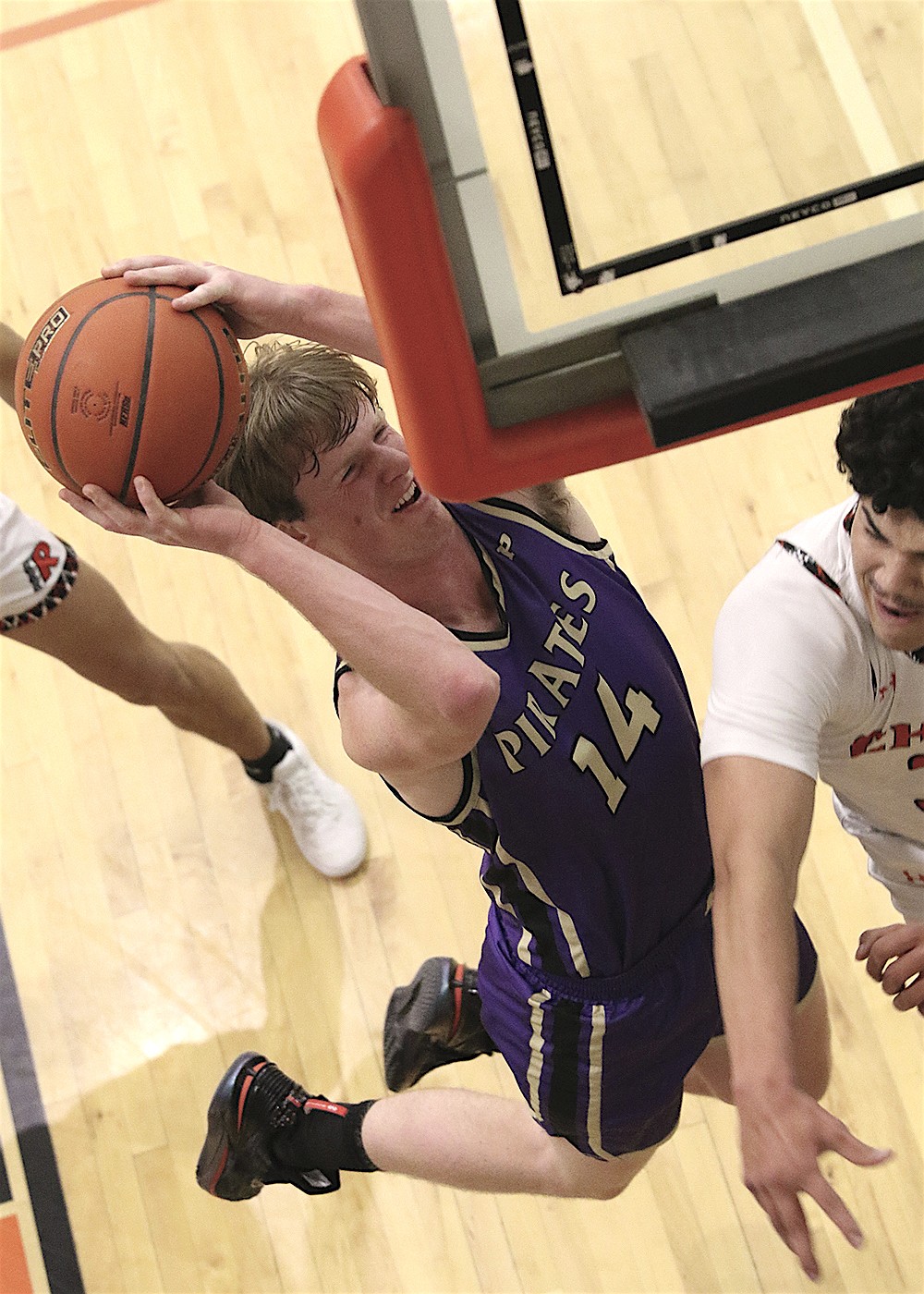 Pirate Brock Henriksen goes for a layup against Ronan during last Tuesday's contest. (Bob Gunderson photo)