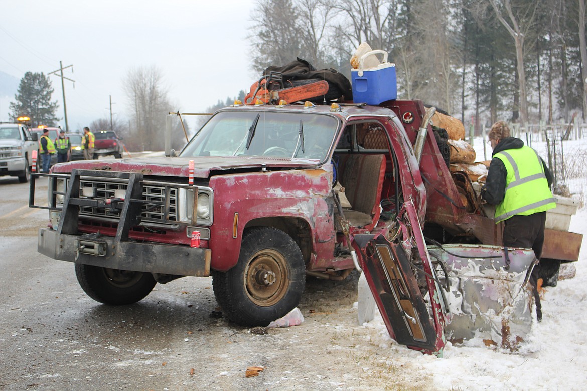 There were no injuries at mile marker 6 on east Mullan Road outside of Superior when a vehicle crossed the center line and made contact with a Montana DOT snowplow. Ice was reported as a key factor in the collision. (Monte Turner/Mineral Independent)