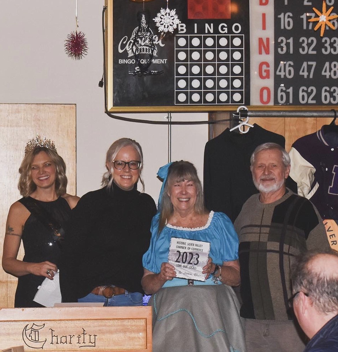 Rachael Krusemark and Keri Alexander present the Love Our Locals Award from Silver Valley Chamber to Joan Block and John Fuller.