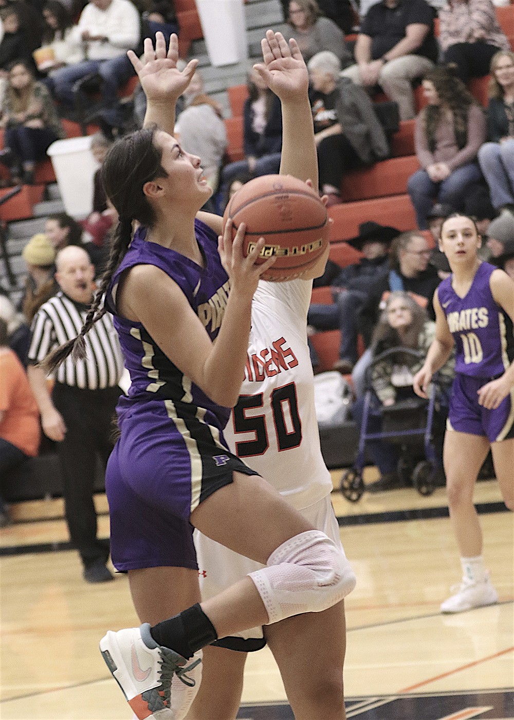 Lady Pirate Natalia Adams goes for a layup against Ronan during last week's Ballers and Brawlers. (Bob Gunderson photo)