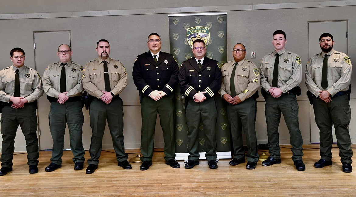 Corrections employees of the Adams County Sheriff’s Office attend a law enforcement awards ceremony. Sheriff Dale Wagner has asked that employees’ pay be increased.