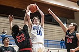 Boys snag a pair of big conference wins