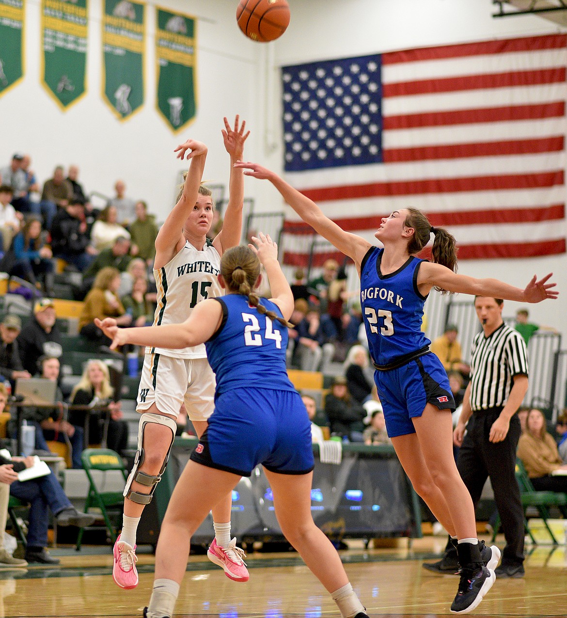 Bulldog Bailey Smith rises up for a 3-pointer against Bigfork on Friday. (Whitney England/Whitefish Pilot)