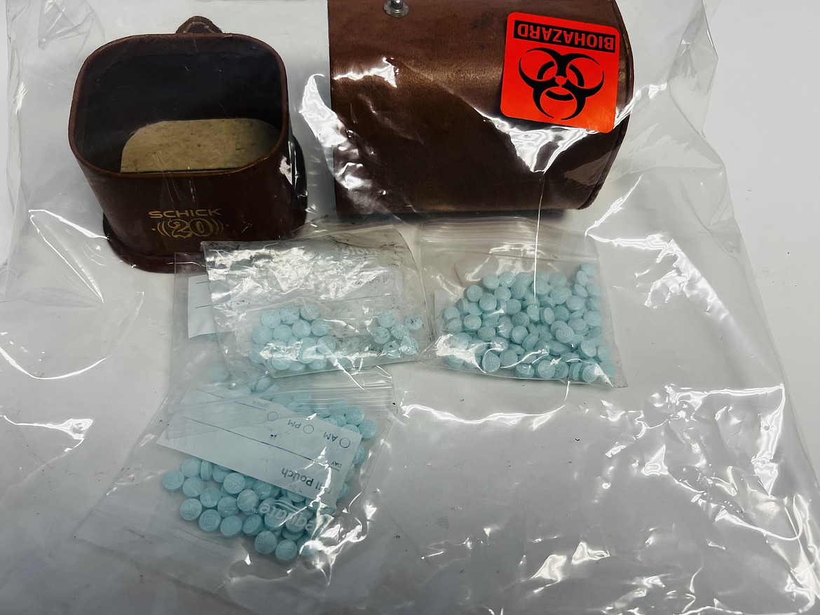 In recent years, law enforcement agencies throughout North Idaho have seized large amounts of "Mexi Blue" fentanyl pills, like those pictured here, from suspected drug traffickers. A new law would create mandatory minimum sentences in Idaho for trafficking fentanyl. These pills were among an estimated 400 seized during an August 2023 police raid in Pinehurst.