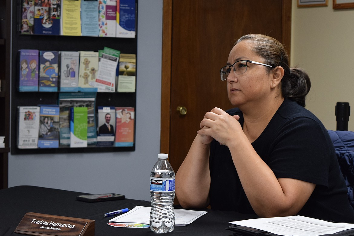 Mattawa City Council member Fabiola Hernandez listens to a presentation during an earlier January council meeting at Mattawa City Hall. Hernandez and the other council members agreed to budget $50,000 as the city’s contribution for a legislative appropriations application project.