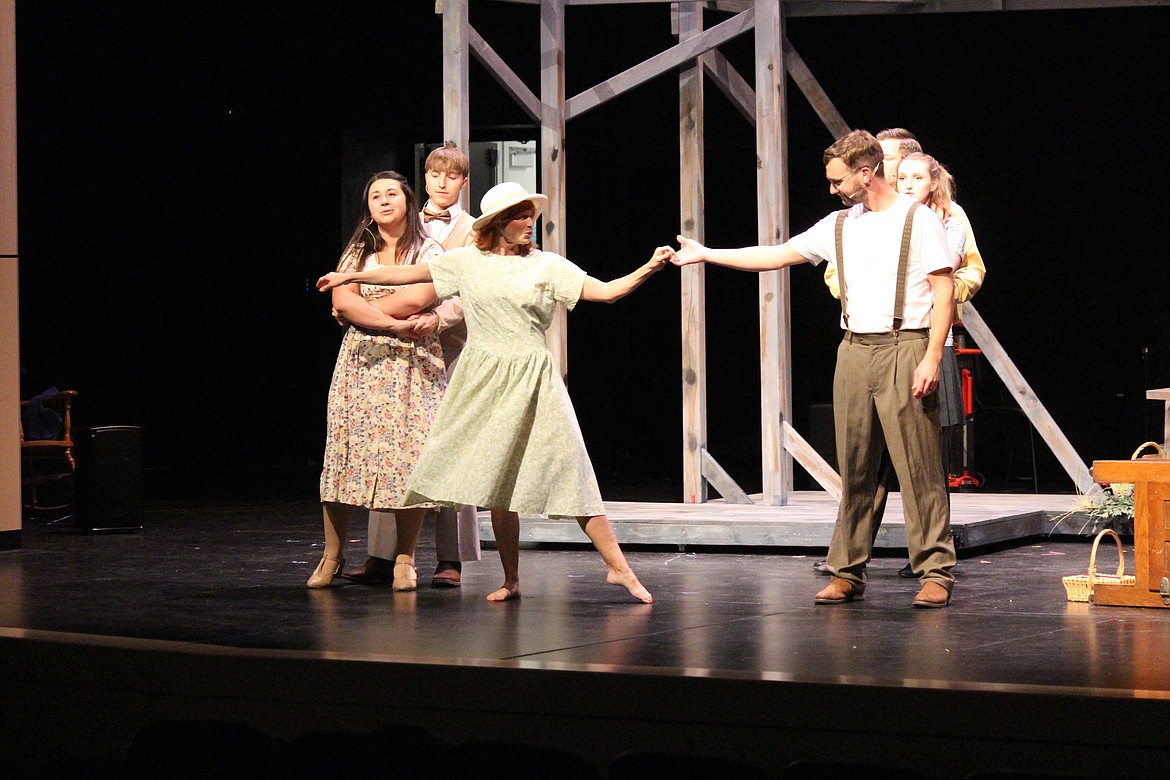 Alice, left, and Jimmy Ray, right, indulge in a dance in the QVAA production of “Bright Star.”