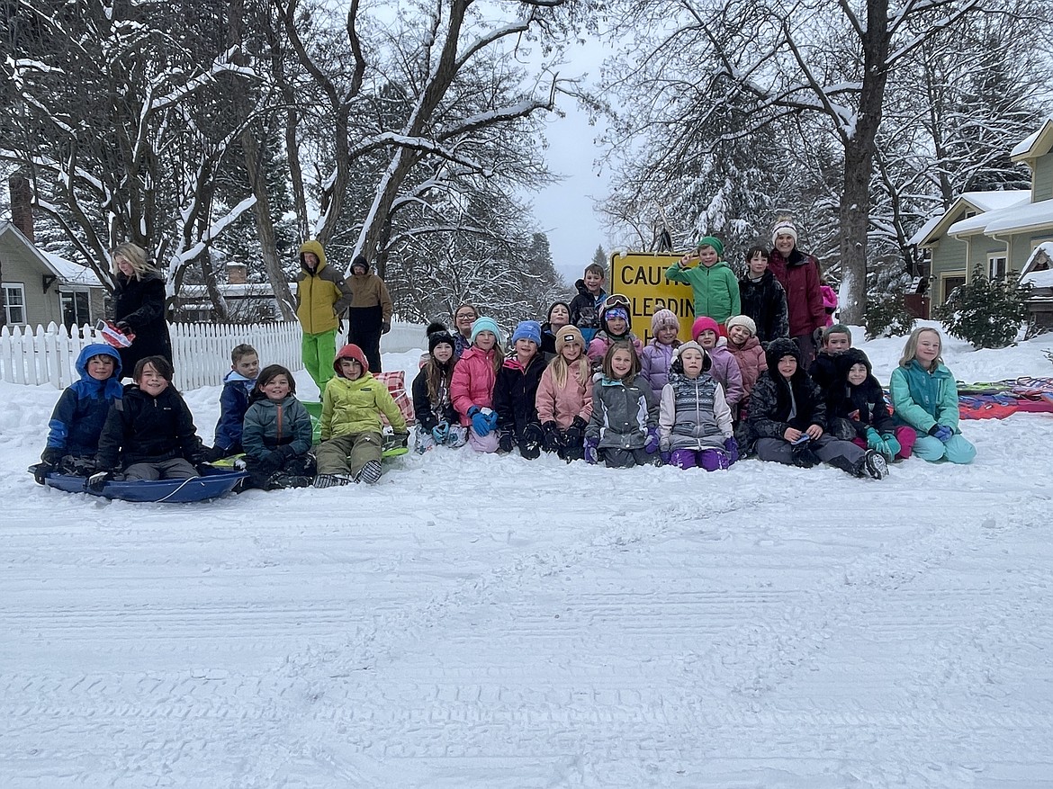 Sorensen Magnet School third graders enjoy a day of science and sledding Friday morning at Boyd Hill during the school's inaugural Gaining Momentum event.